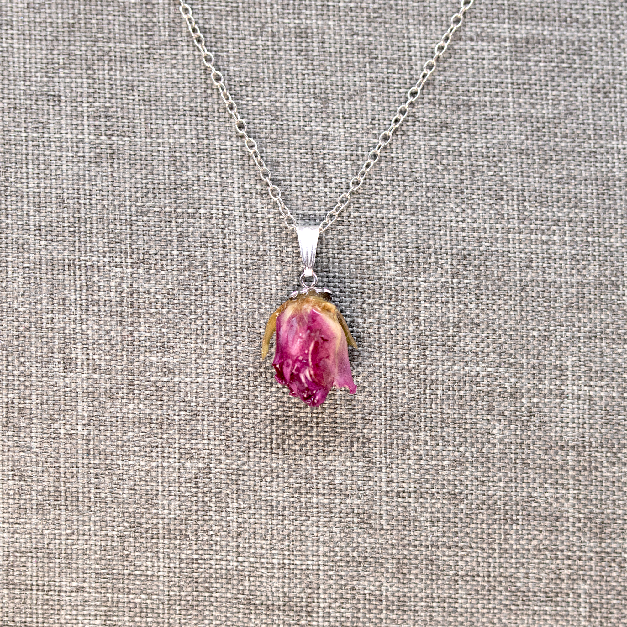 Real rose bud purple flower pendant silver finish.png