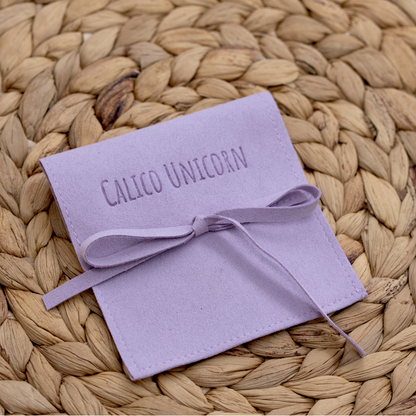 Calico Unicorn jewelry pouch 1.png