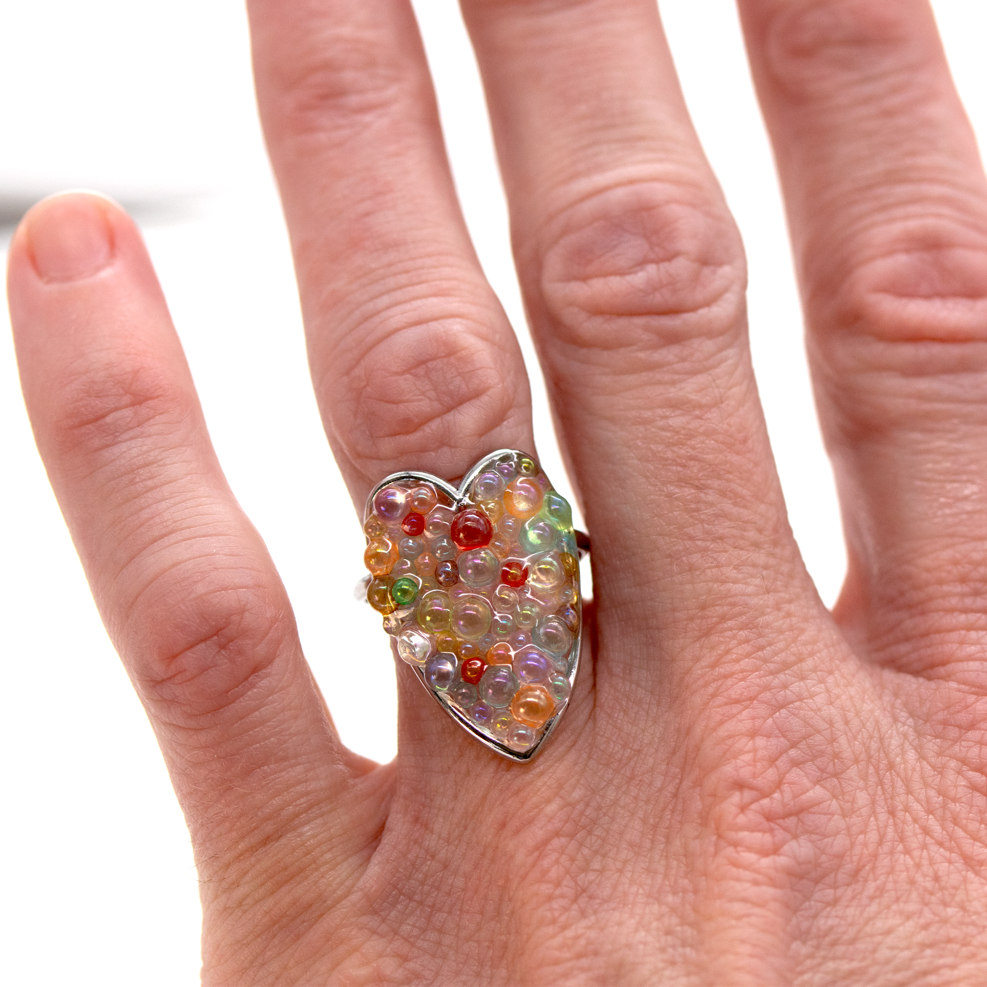 Glass bubble heart adjustable ring 1.png