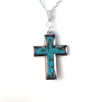 Turqoise and pyrite inlay cross pendant in silver.png